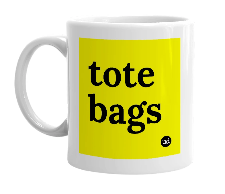 White mug with 'tote bags' in bold black letters