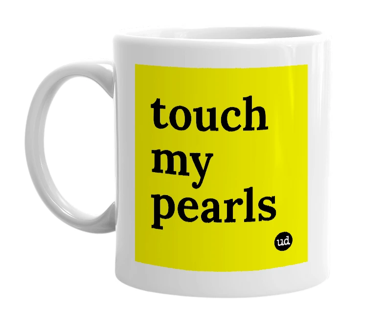 White mug with 'touch my pearls' in bold black letters