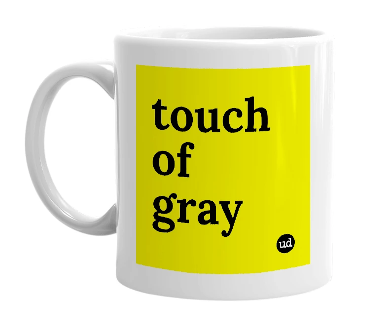 White mug with 'touch of gray' in bold black letters