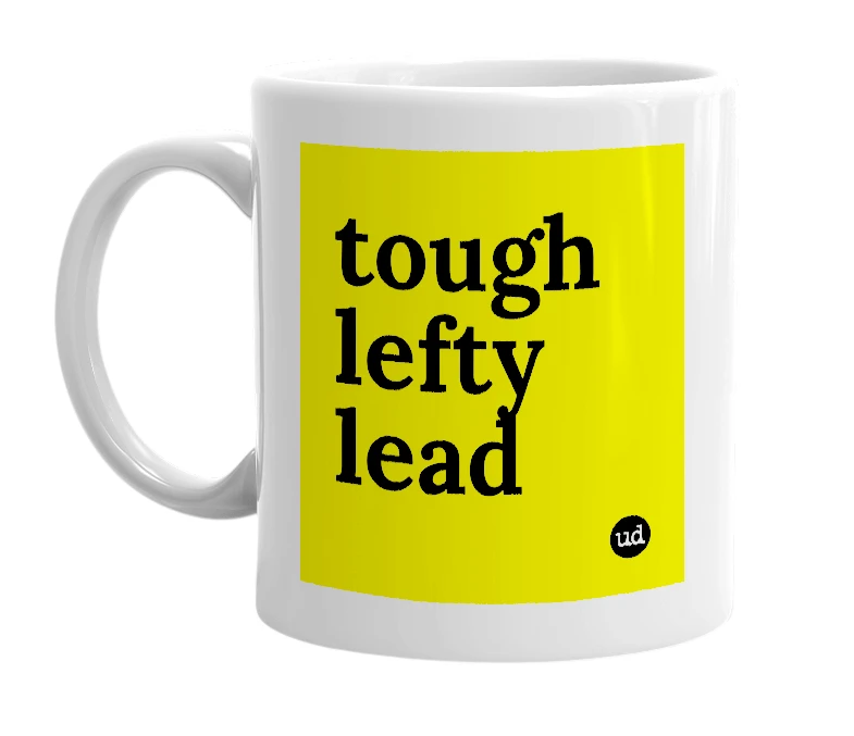 White mug with 'tough lefty lead' in bold black letters