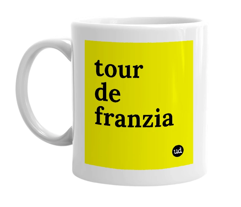 White mug with 'tour de franzia' in bold black letters