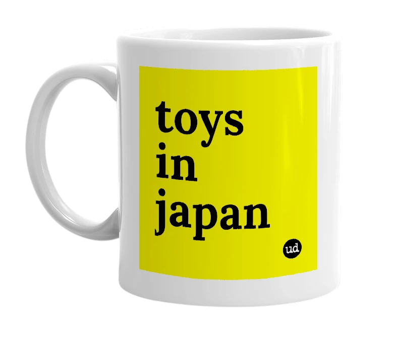 White mug with 'toys in japan' in bold black letters