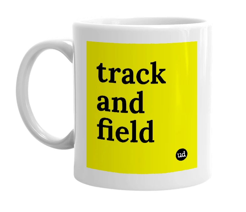 White mug with 'track and field' in bold black letters