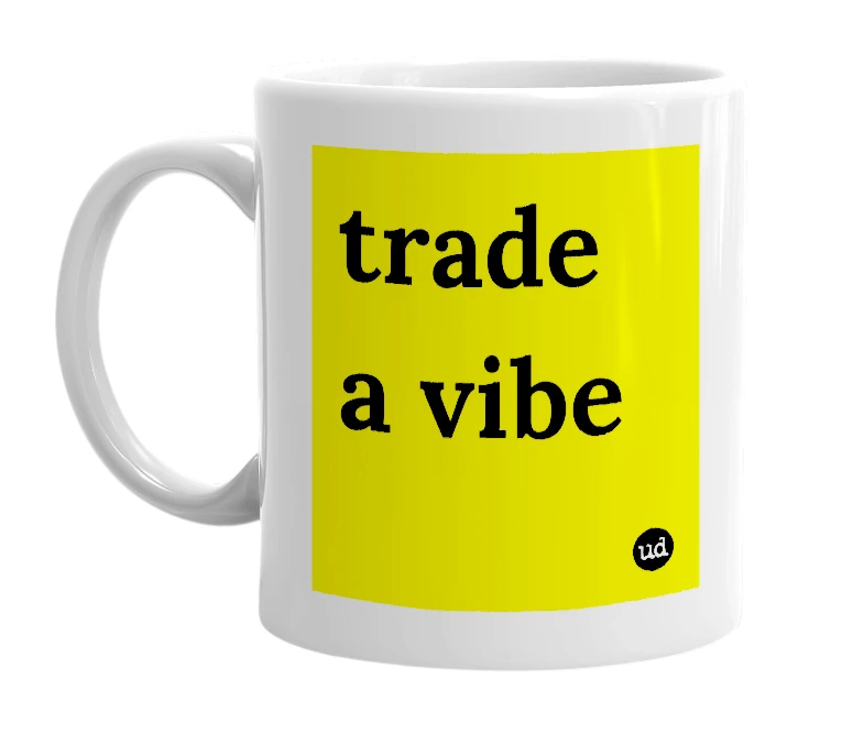 White mug with 'trade a vibe' in bold black letters