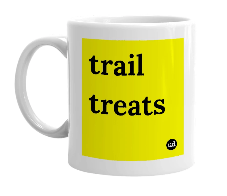 White mug with 'trail treats' in bold black letters