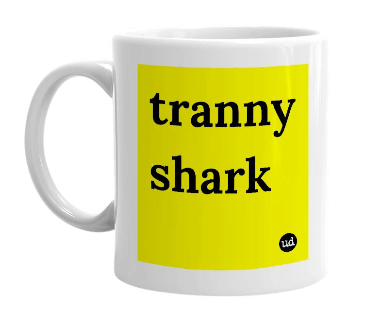 White mug with 'tranny shark' in bold black letters