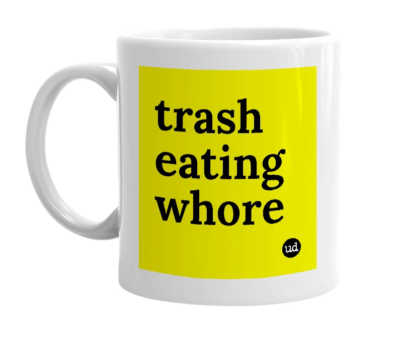White mug with 'trash eating whore' in bold black letters