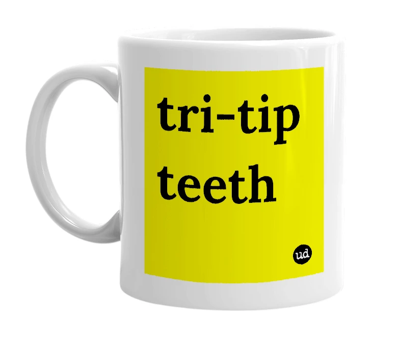 White mug with 'tri-tip teeth' in bold black letters