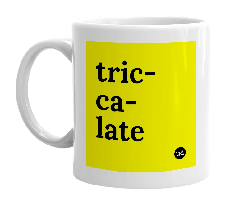 White mug with 'tric-ca-late' in bold black letters