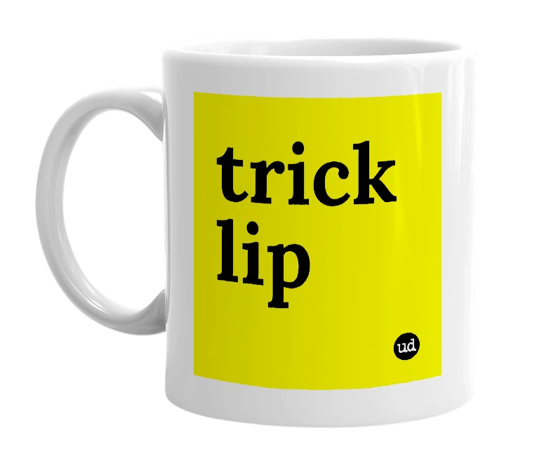 White mug with 'trick lip' in bold black letters