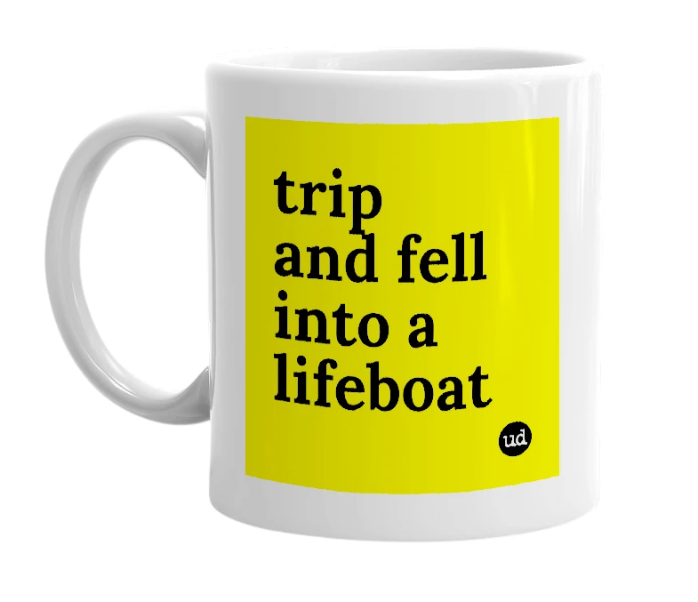 White mug with 'trip and fell into a lifeboat' in bold black letters