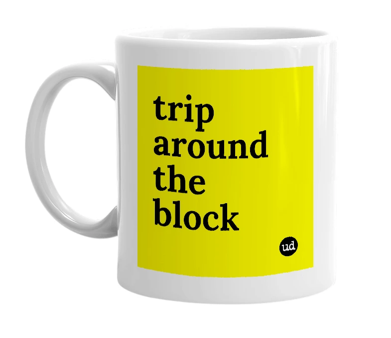 White mug with 'trip around the block' in bold black letters