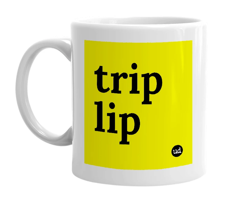 White mug with 'trip lip' in bold black letters