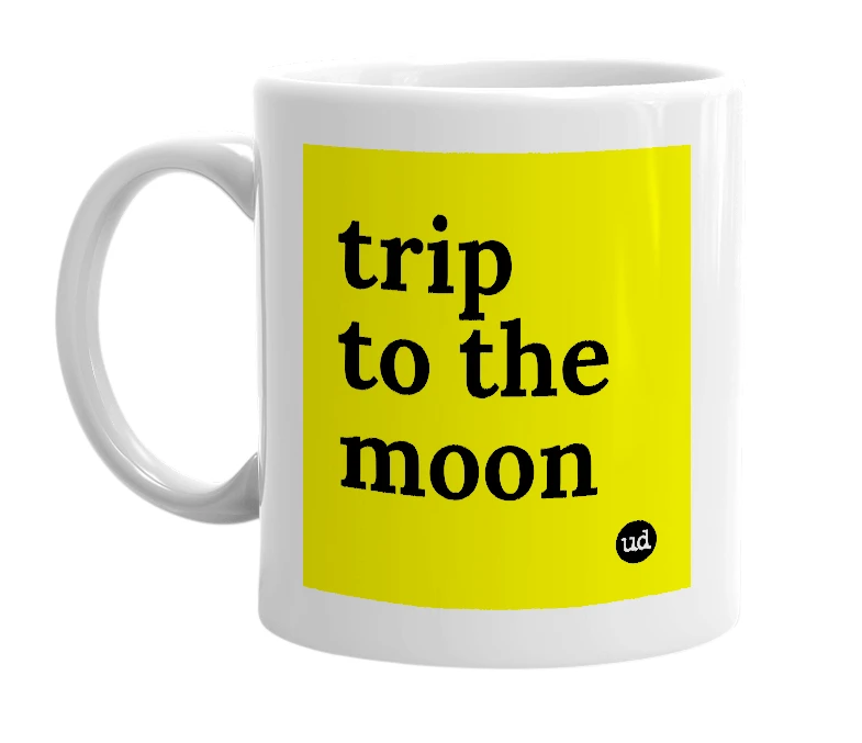 White mug with 'trip to the moon' in bold black letters