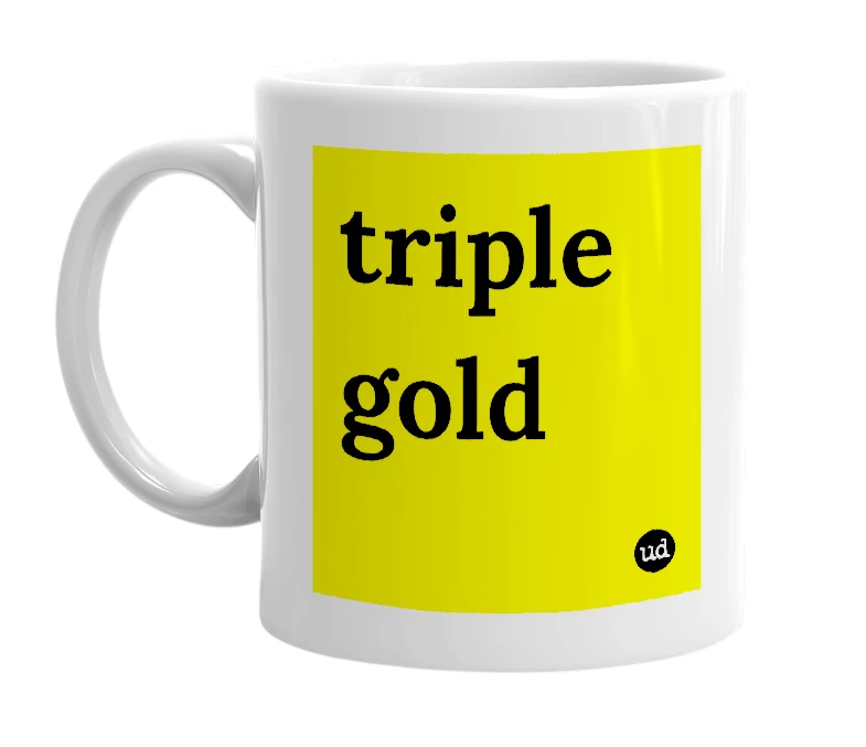 White mug with 'triple gold' in bold black letters