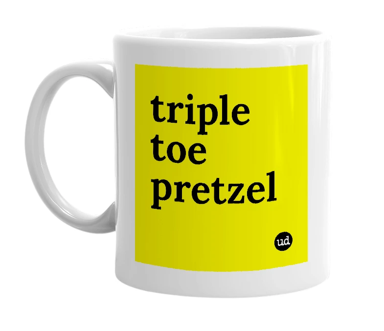 White mug with 'triple toe pretzel' in bold black letters