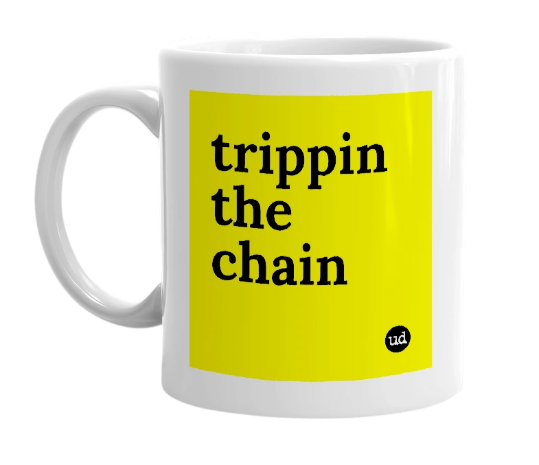 White mug with 'trippin the chain' in bold black letters