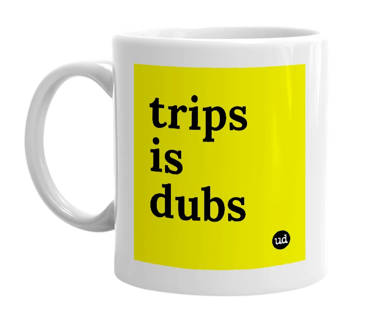 White mug with 'trips is dubs' in bold black letters