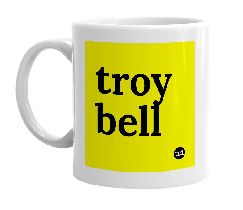 White mug with 'troy bell' in bold black letters