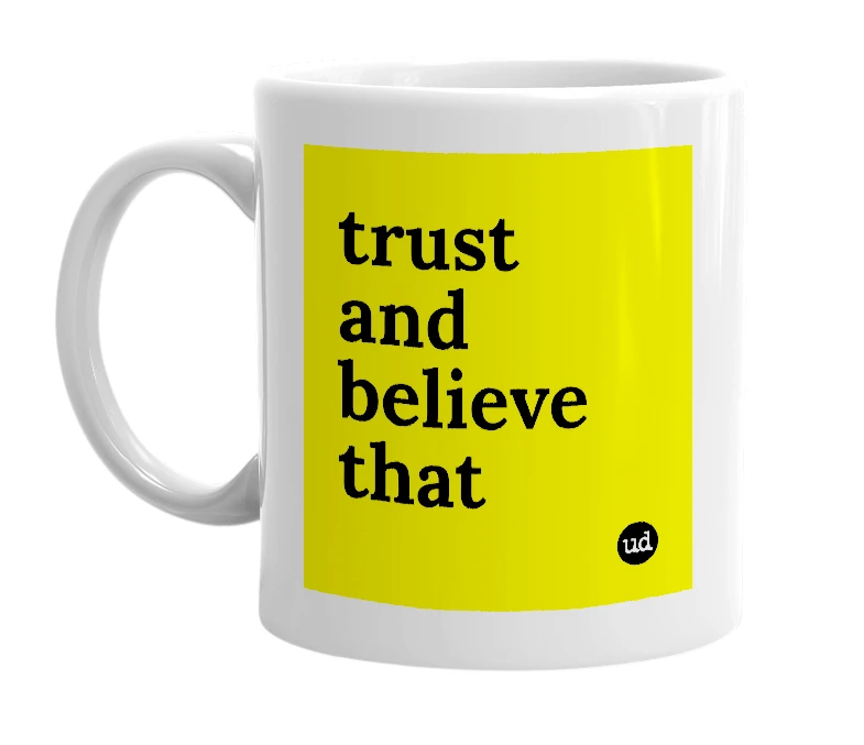 White mug with 'trust and believe that' in bold black letters
