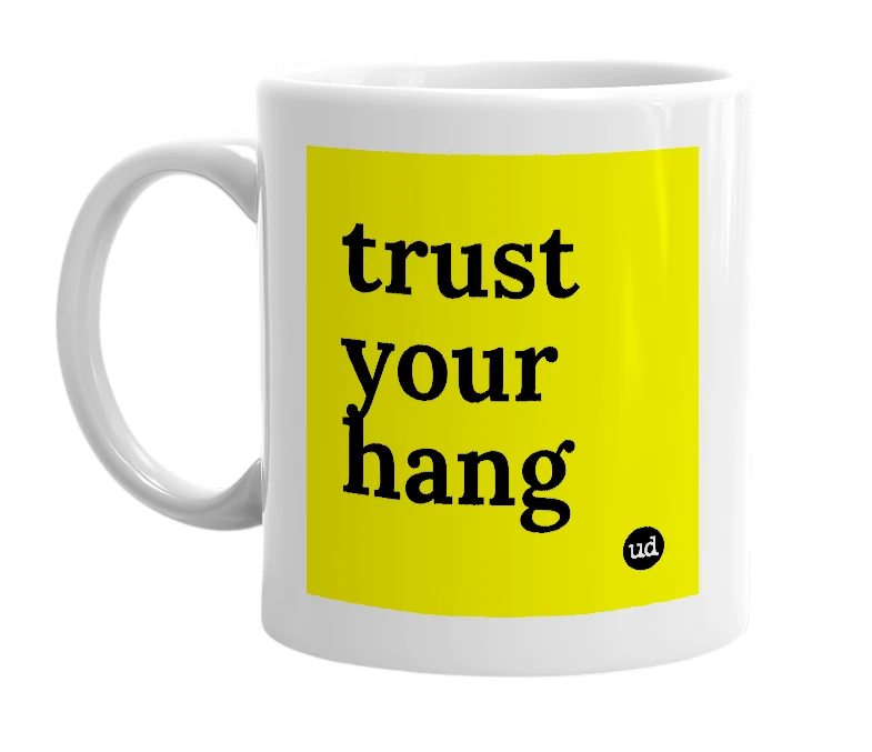 White mug with 'trust your hang' in bold black letters