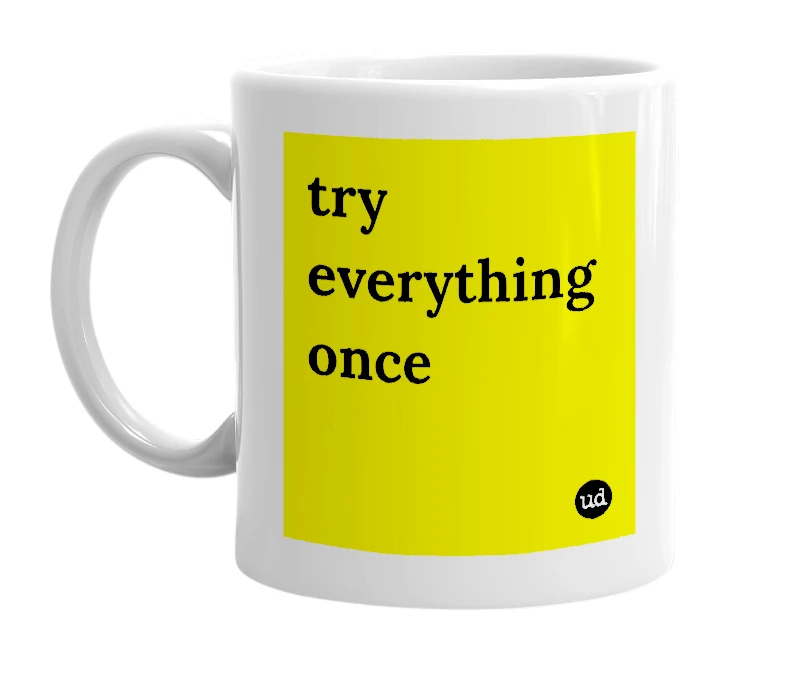 White mug with 'try everything once' in bold black letters