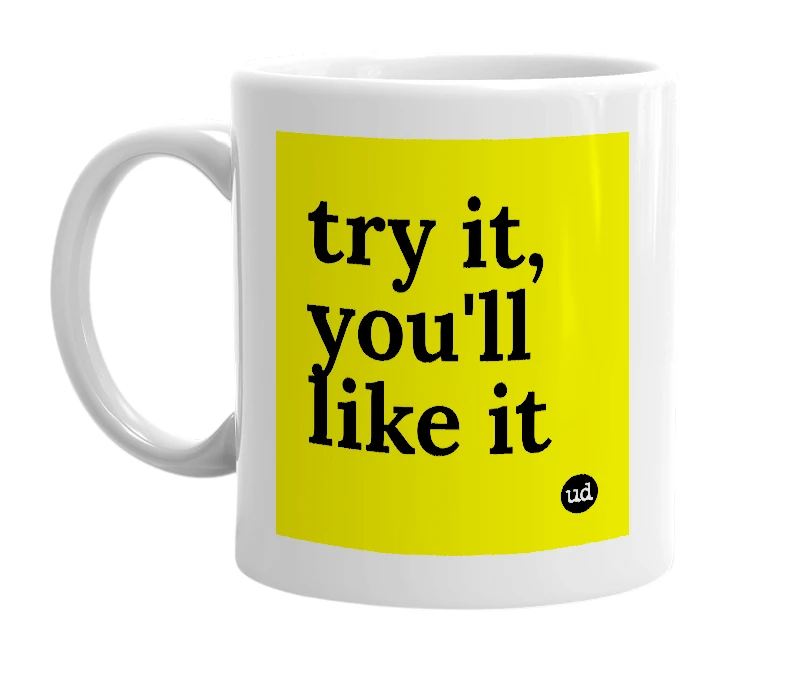 White mug with 'try it, you'll like it' in bold black letters