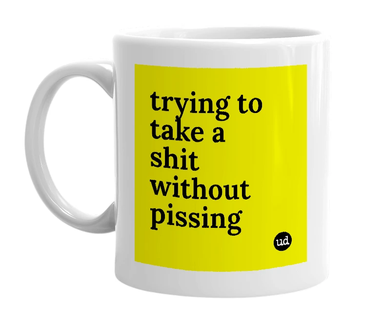 White mug with 'trying to take a shit without pissing' in bold black letters