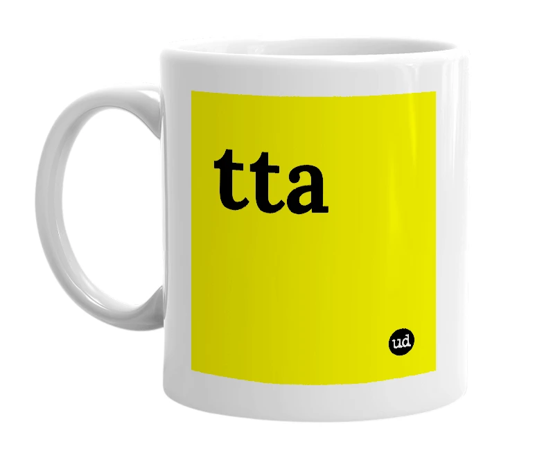 White mug with 'tta' in bold black letters