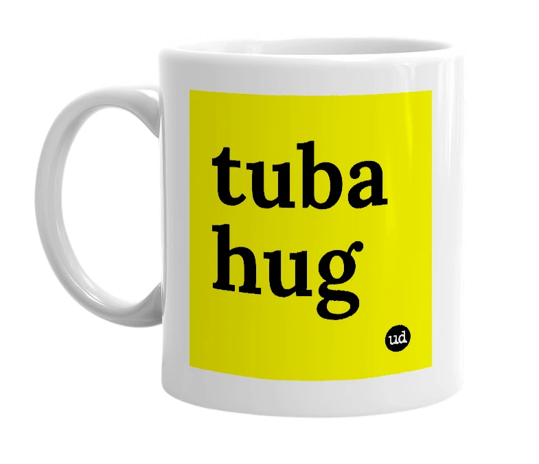 White mug with 'tuba hug' in bold black letters