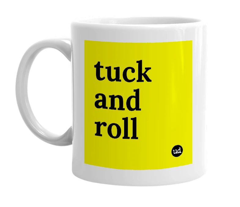 White mug with 'tuck and roll' in bold black letters