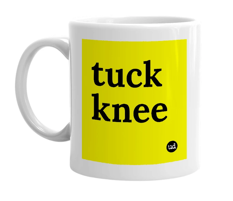 White mug with 'tuck knee' in bold black letters