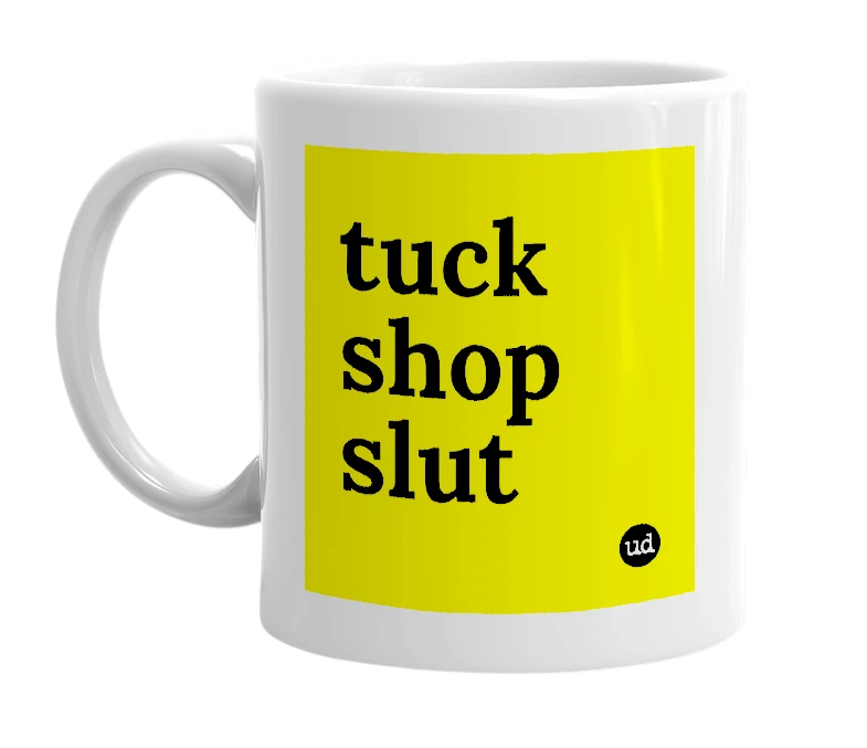 White mug with 'tuck shop slut' in bold black letters