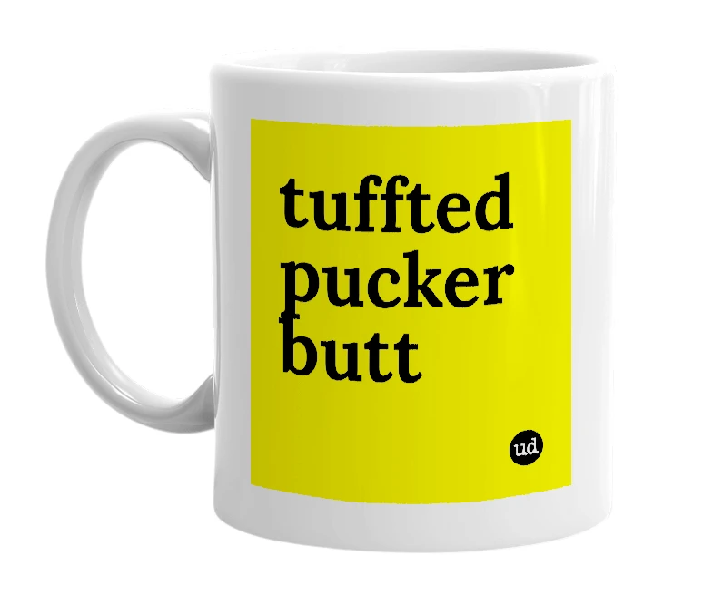 White mug with 'tuffted pucker butt' in bold black letters
