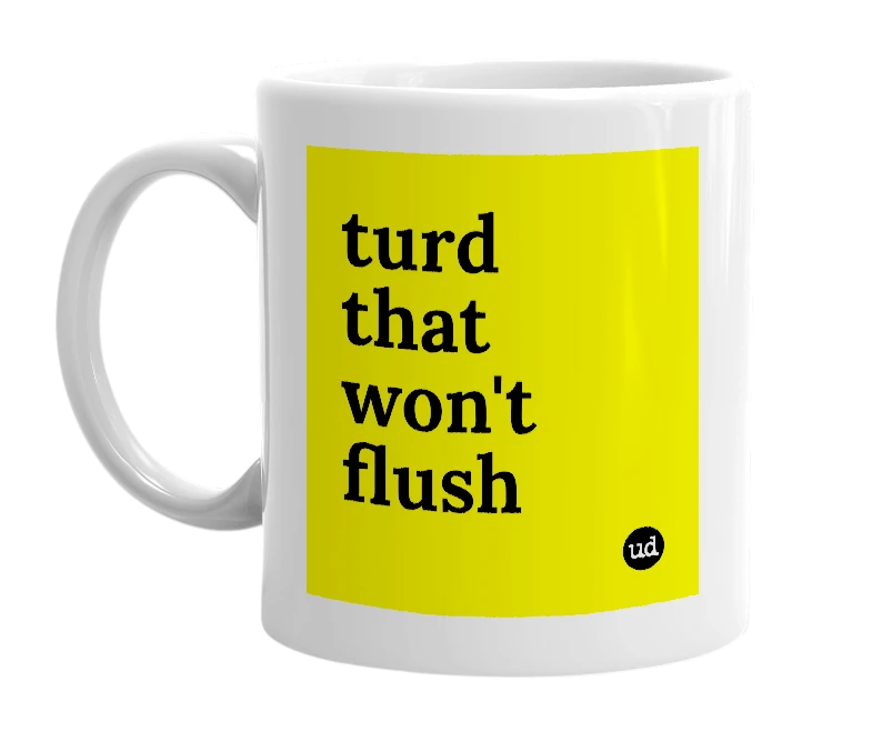 White mug with 'turd that won't flush' in bold black letters