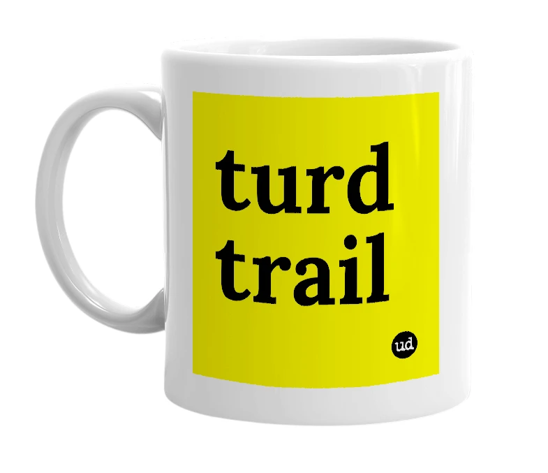 White mug with 'turd trail' in bold black letters