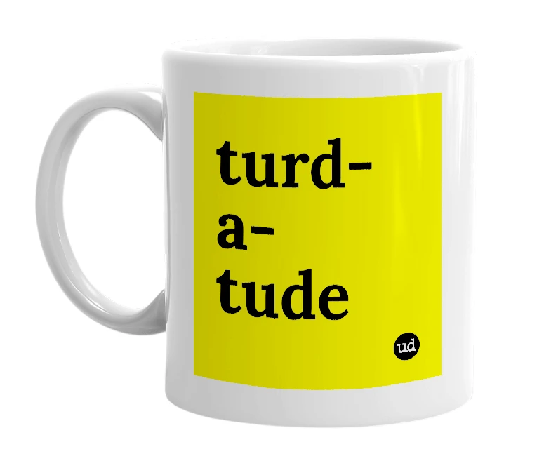 White mug with 'turd-a-tude' in bold black letters