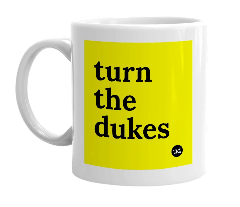 White mug with 'turn the dukes' in bold black letters