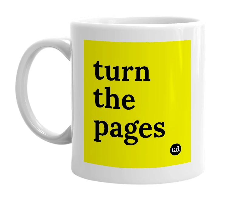 White mug with 'turn the pages' in bold black letters