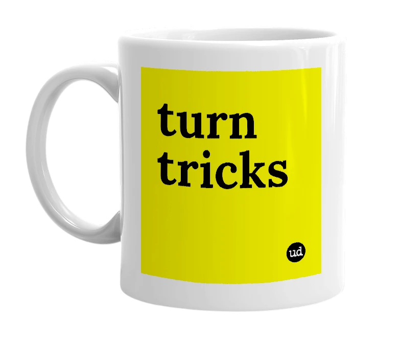 White mug with 'turn tricks' in bold black letters