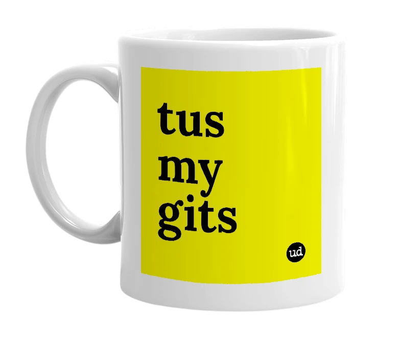 White mug with 'tus my gits' in bold black letters