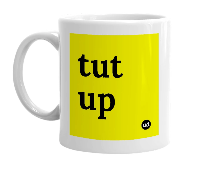 White mug with 'tut up' in bold black letters