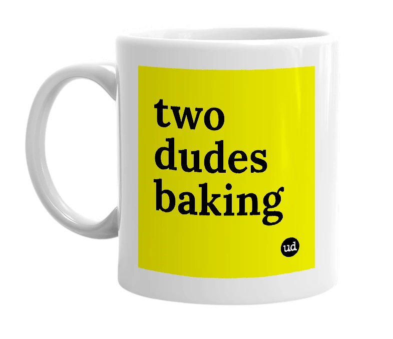 White mug with 'two dudes baking' in bold black letters