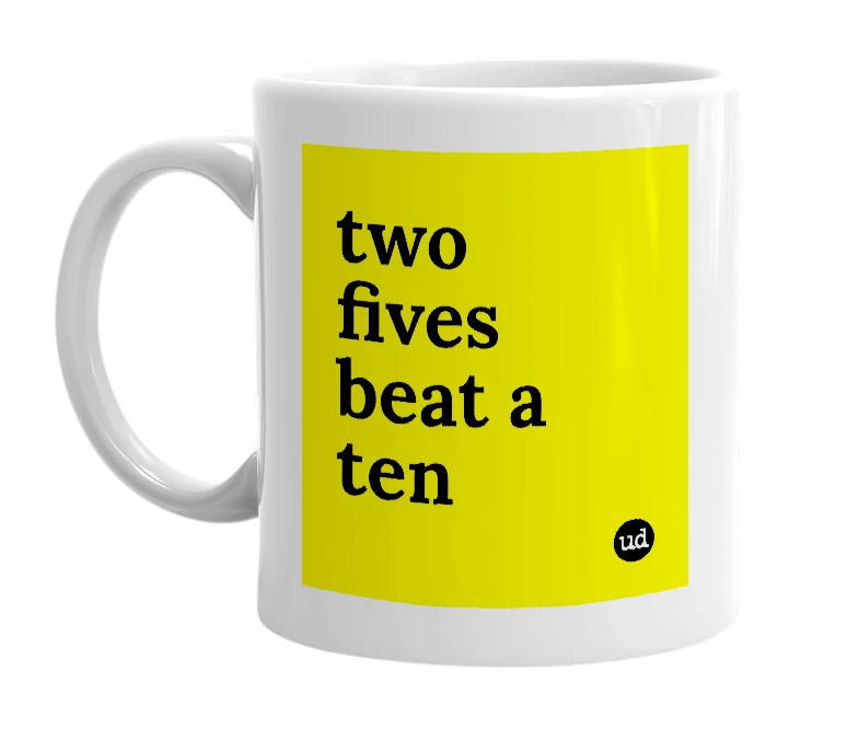 White mug with 'two fives beat a ten' in bold black letters