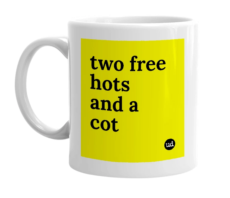 White mug with 'two free hots and a cot' in bold black letters