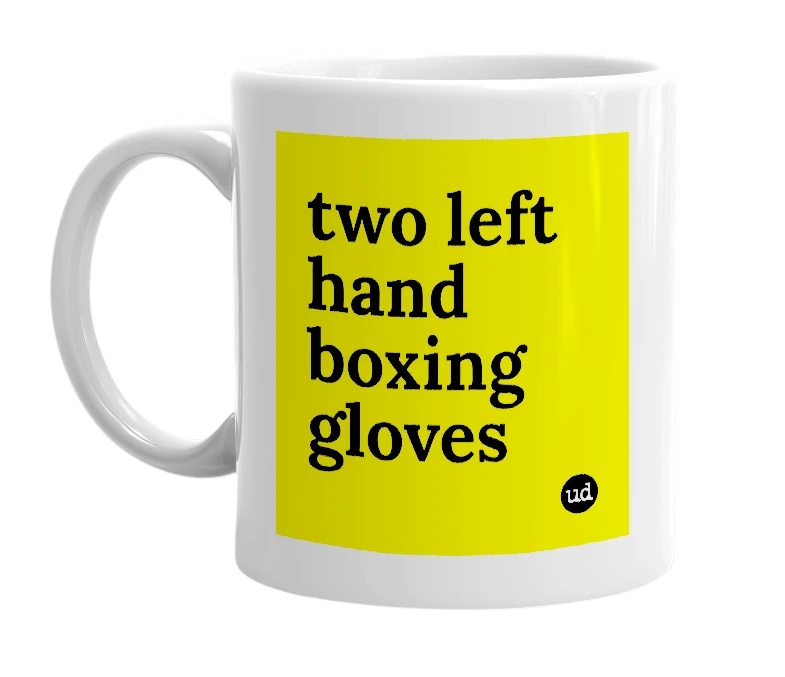 White mug with 'two left hand boxing gloves' in bold black letters