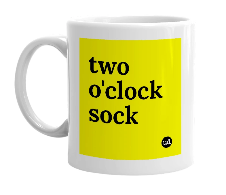 White mug with 'two o'clock sock' in bold black letters