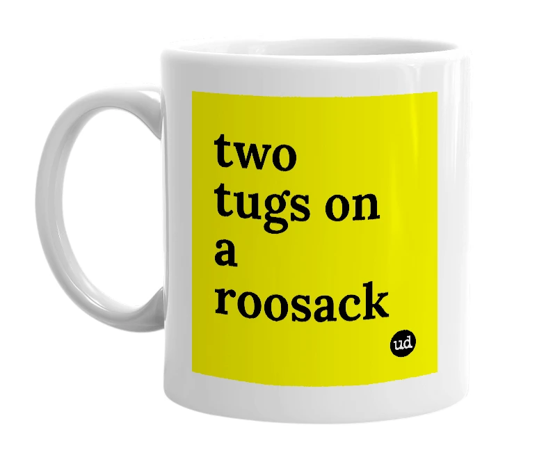 White mug with 'two tugs on a roosack' in bold black letters