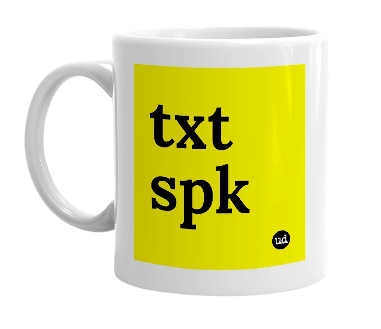White mug with 'txt spk' in bold black letters