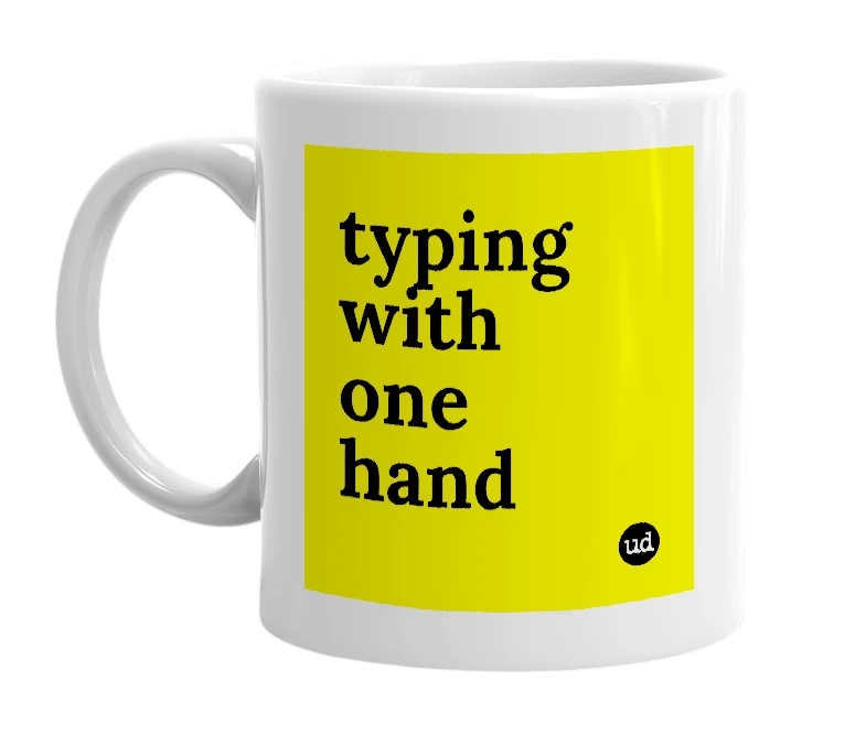 White mug with 'typing with one hand' in bold black letters